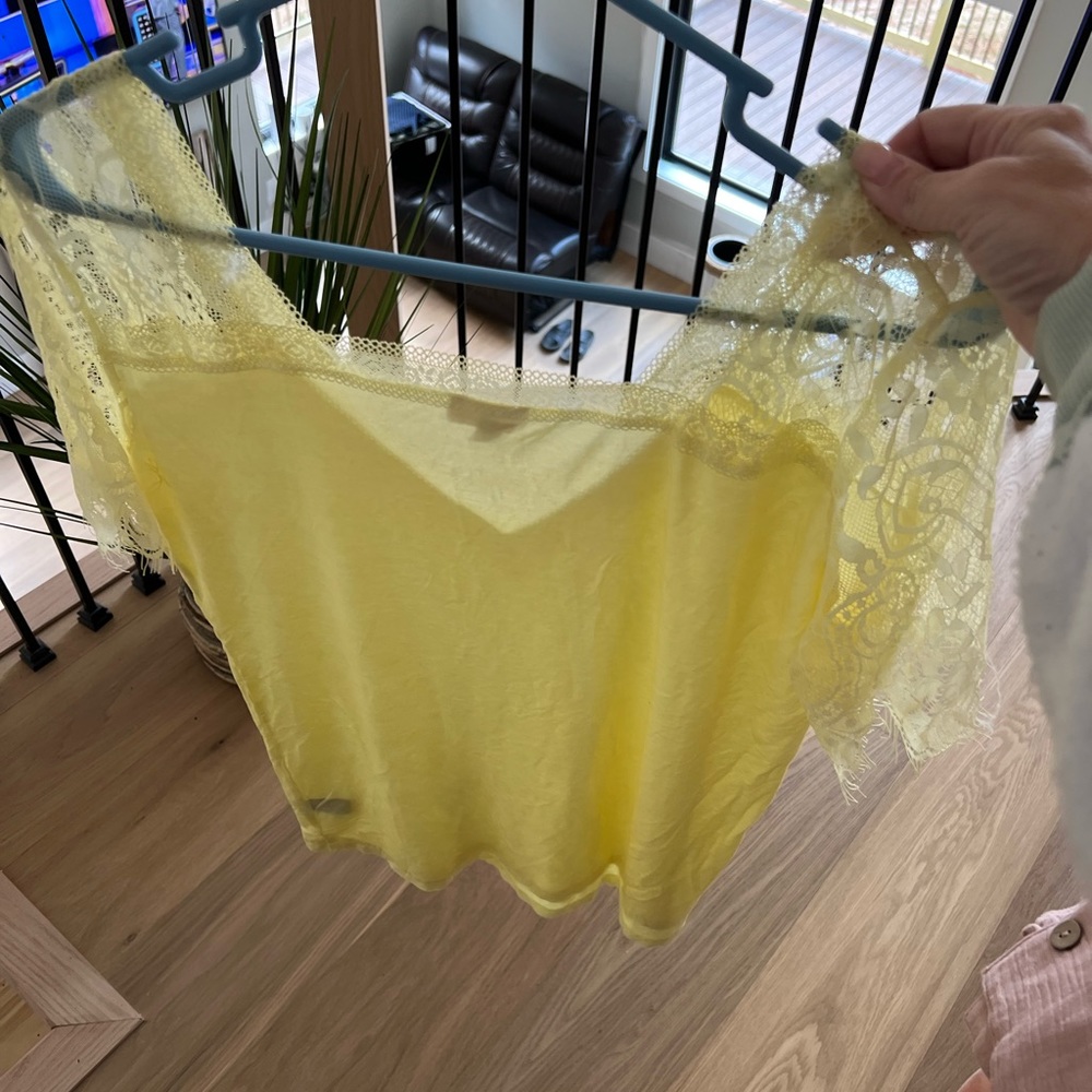 Yellow size small Pol shirt, true to size with some stretch. - Picture 3 of 4